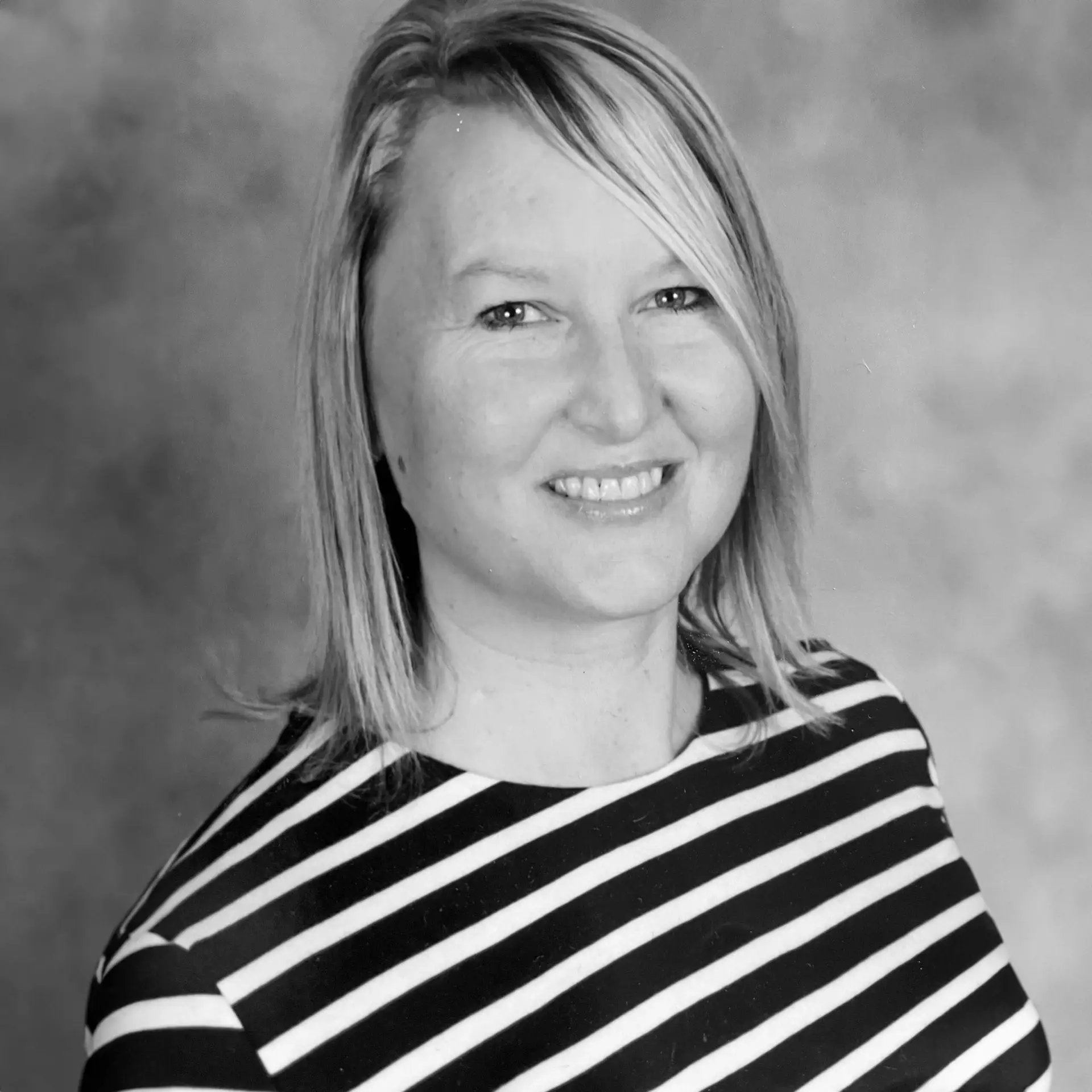 Anna Kokesh, Everyday Faith Podcast guest, smiling portrait