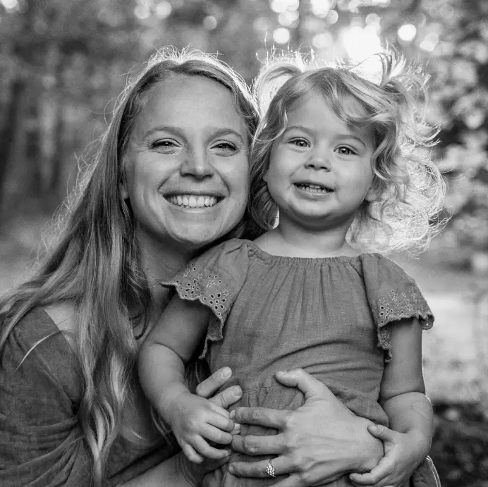 Dan and Jess, Everyday Faith Podcast hosts, with their daughter.