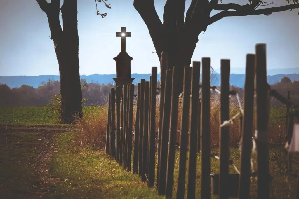 Christian cross and fence symbolizing judgment and faith in the Bible.