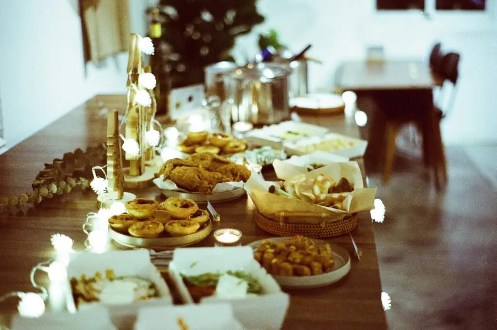 Christmas dinner table with food and decorations, festive gathering and family traditions