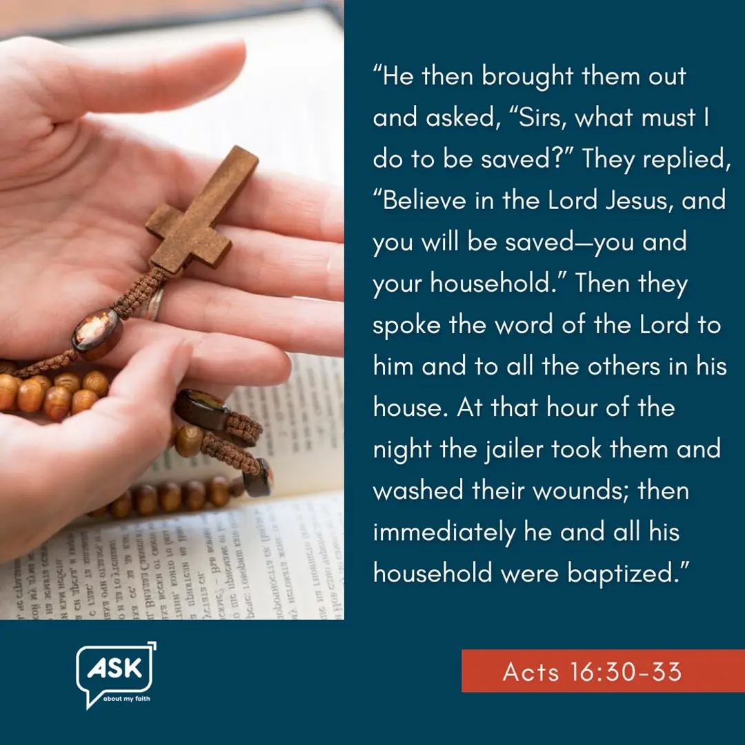 Hands holding open Bible with Acts 16:30-33 passage, illustrating faith and salvation for new Christians.