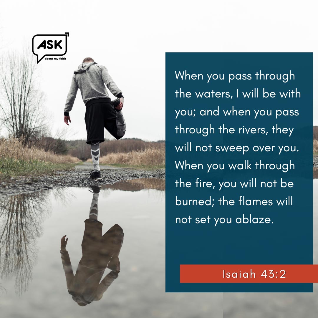 Man walking through water reflecting Isaiah 43:2 scripture for new Christians.